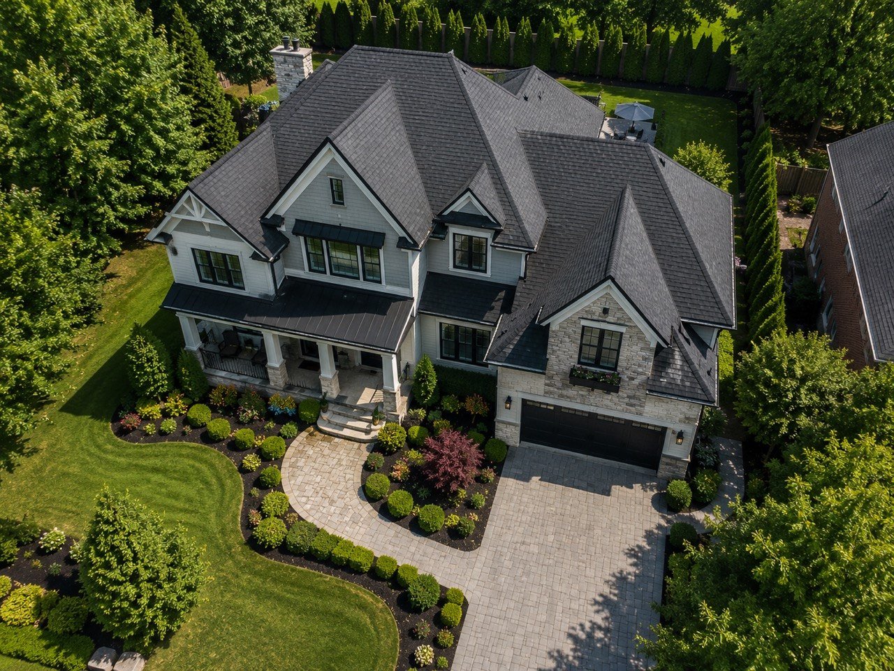 Aerial view of seamless gutter installation on large Pennsylvania home